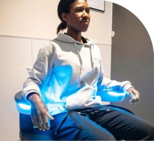 Re:nu client undergoing a relaxing electromagnetic pelvic floor treatment in Greenwich, London