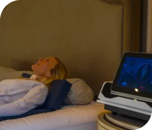 Woman receiving PEMF therapy in London using Re:nu's state-of-the-art PEMF mat and device