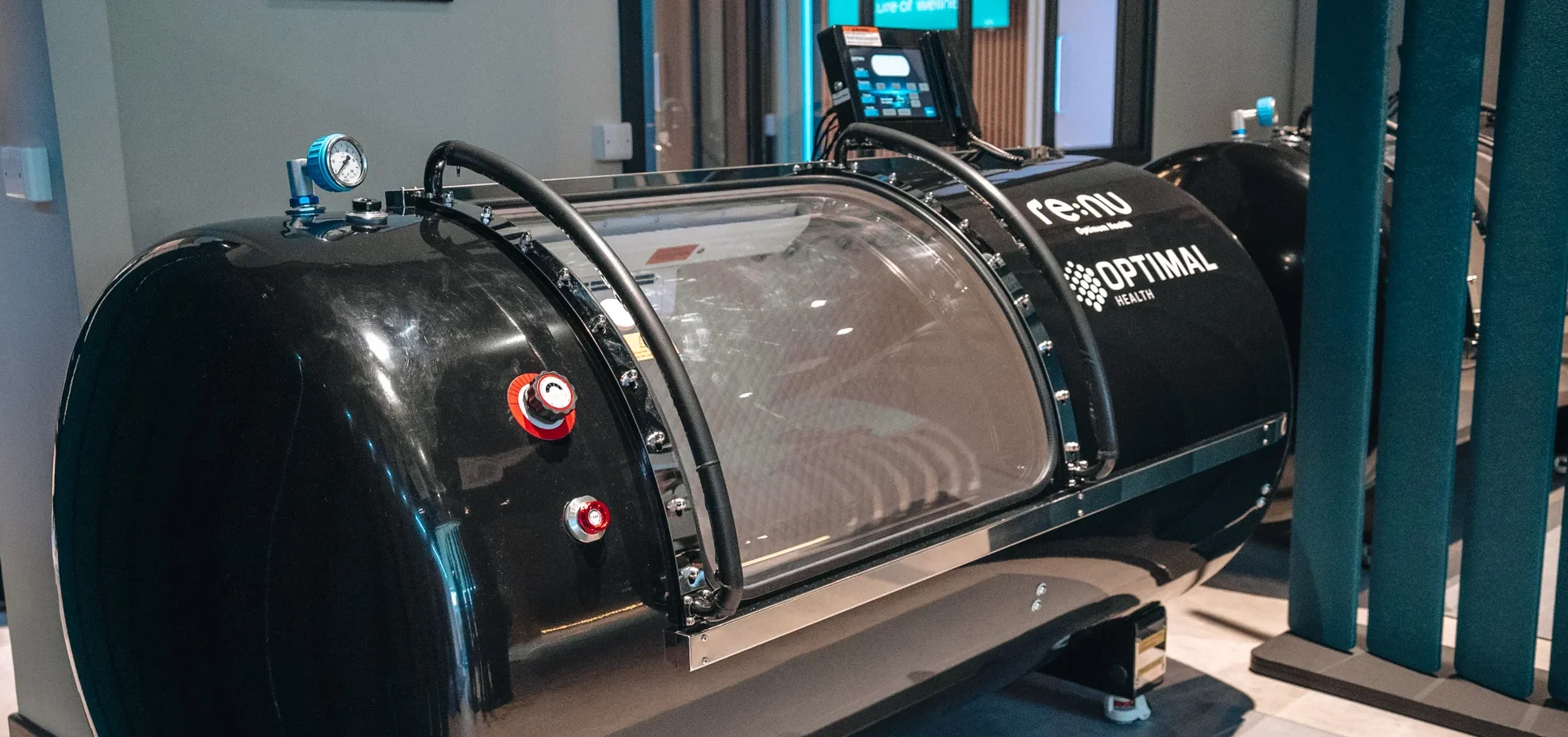 Angled view of Re:nu Optimum Health hyperbaric oxygen therapy chamber