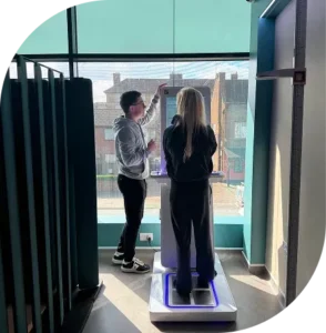 Re:nu wellness specialist explaining the Mediscan full-body health scan in London.