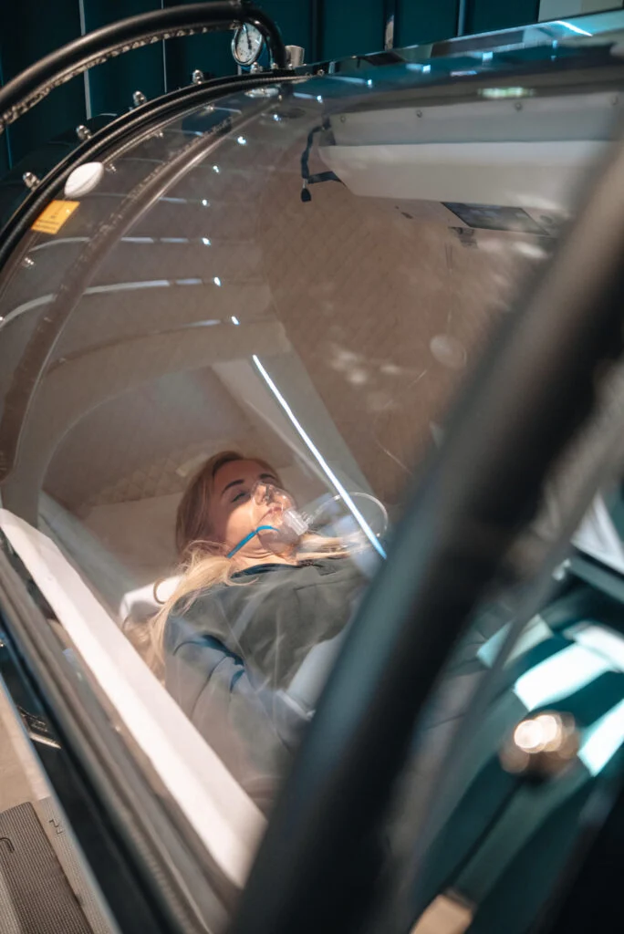 Re:nu London customer using hyperbaric oxygen therapy for recovery, longevity, and mental health support.