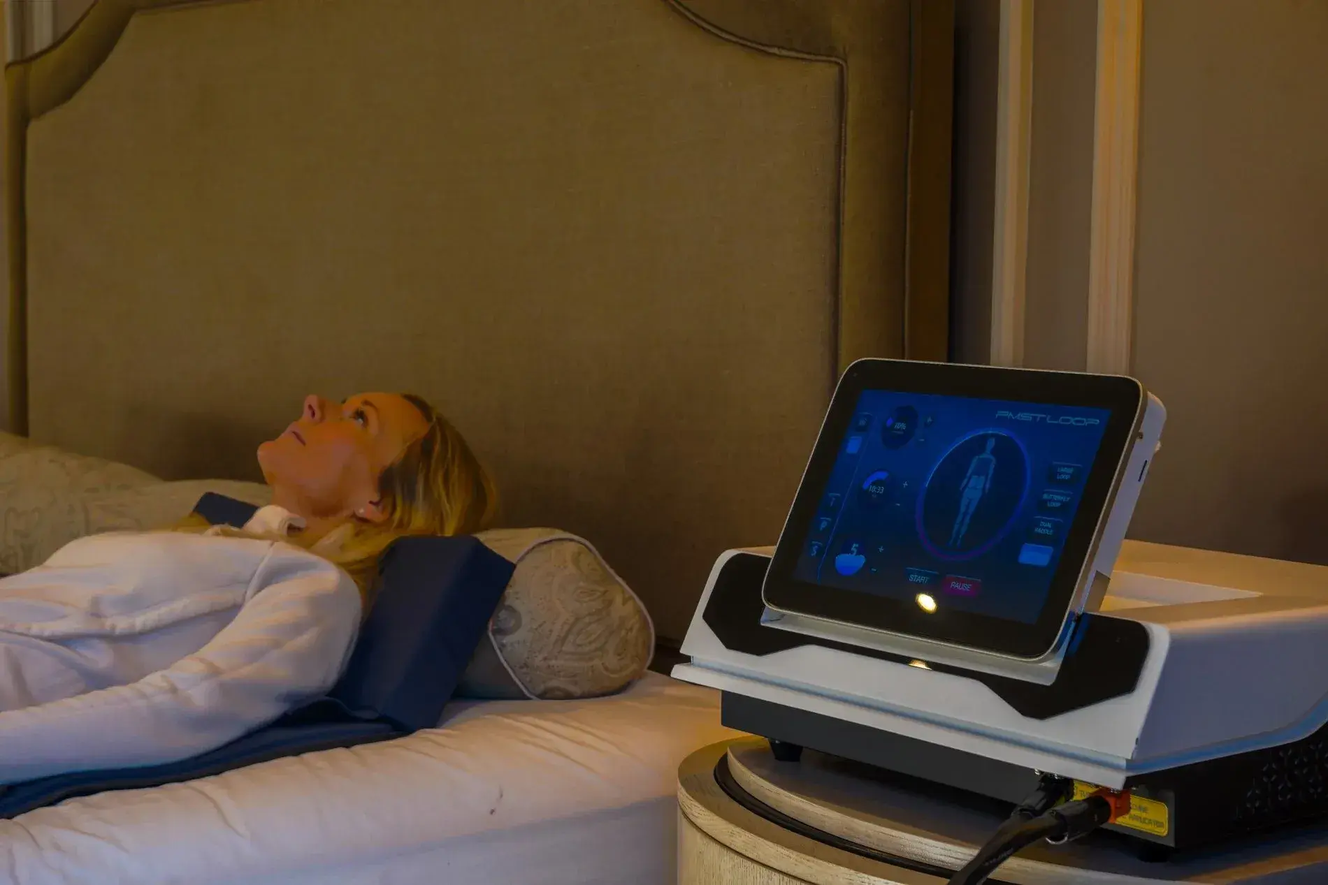 Re:nu London customer receiving PEMF therapy for recovery, movement, and well-being