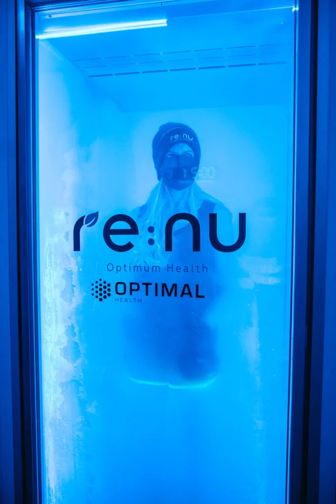 Customer using Re:nu Optimum Health cryotherapy chamber in London to support recovery, longevity, and mental resilience.