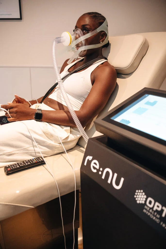 Woman using IHHT to support longevity and overall vitality at Re:nu London