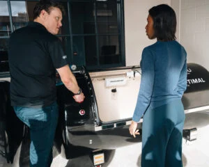 A Re:nu specialist introducing a client to hyperbaric oxygen therapy at the Re:nu Optimum Health centre in Greenwich, London