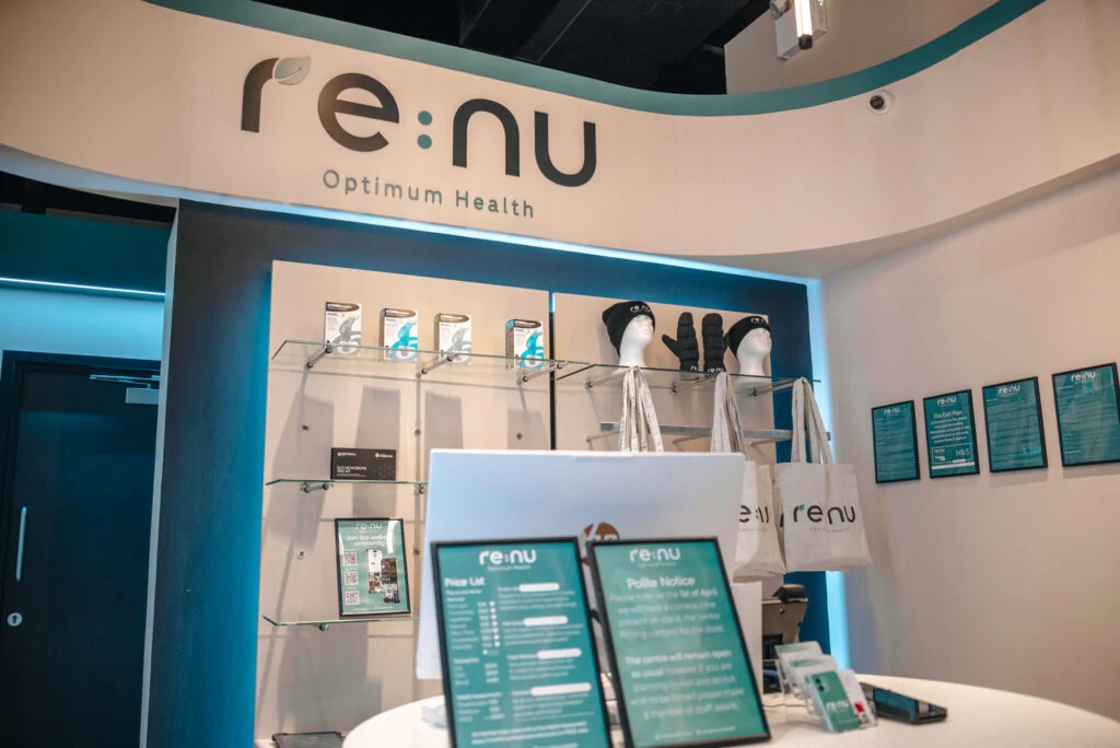 Re:nu Optimum Health London wellness centre reception area showcasing products and helpful customer information