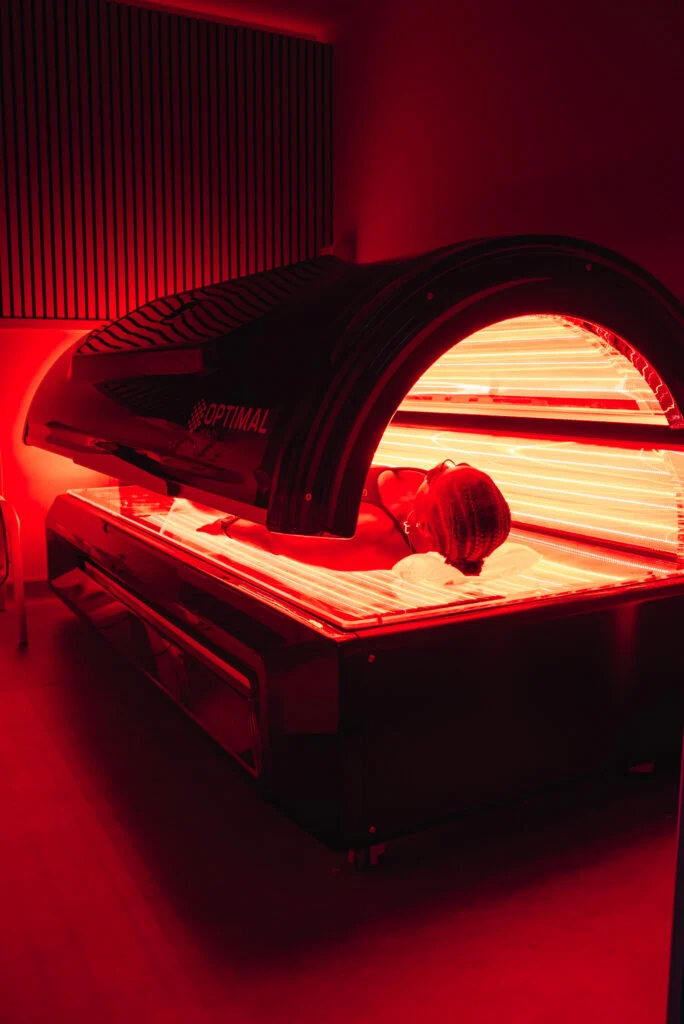 Re:nu London customer using full-body red light therapy to support recovery, longevity, and mental health.