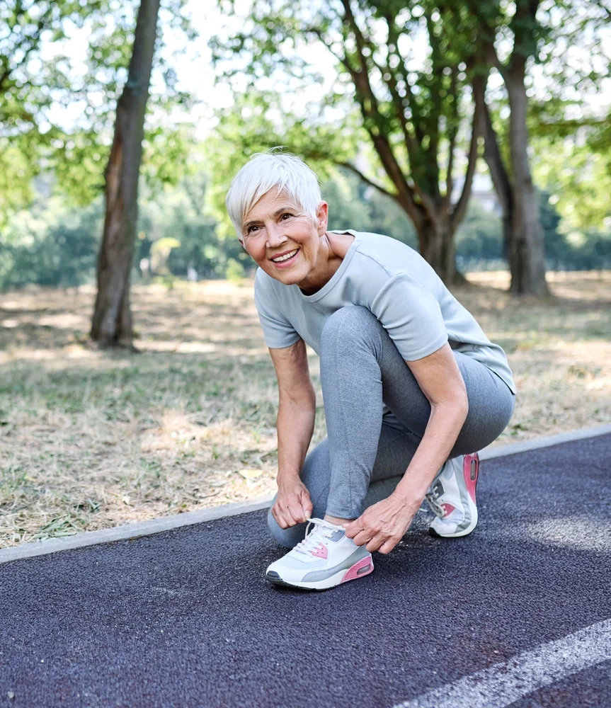 Portrait,of,a,happy,active,elderly,senior,woman,posing,fixing