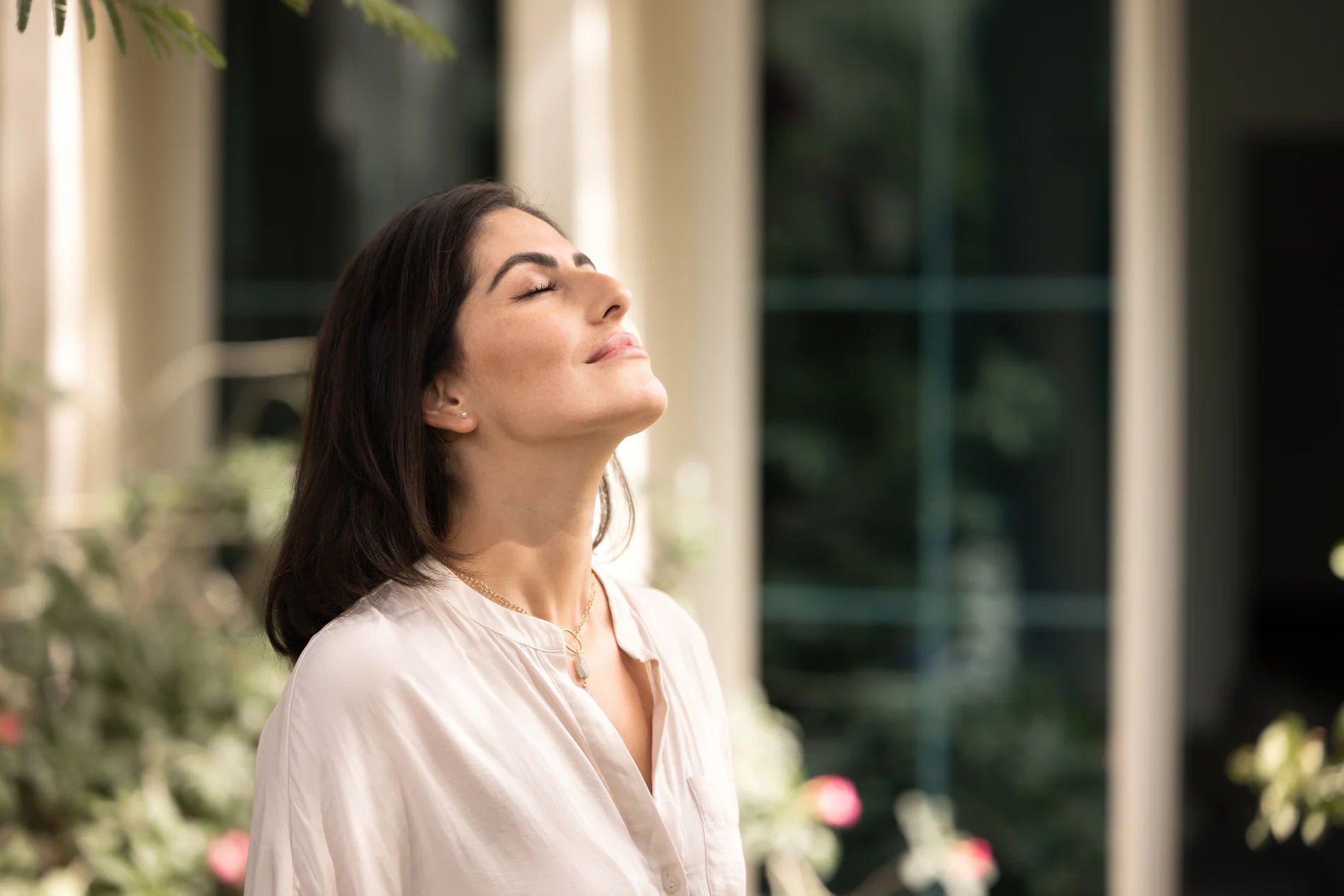 Peaceful woman demonstrating the benefits of mental clarity and nervous system regulation