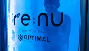 Re:nu London client using a cryotherapy chamber at Re:nu Optimum Health, Greenwich.