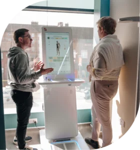 Re:nu wellness specialist in consultation with a new client at the South East London biohacking wellness centre