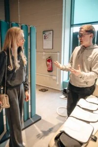 Re:nu London wellness centre manager discussing biohacking treatment options with a new customer.